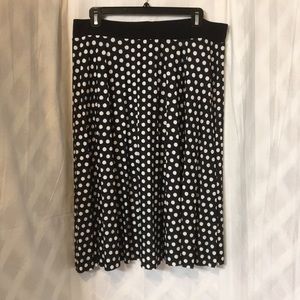 Pleated, polka dot skirt.